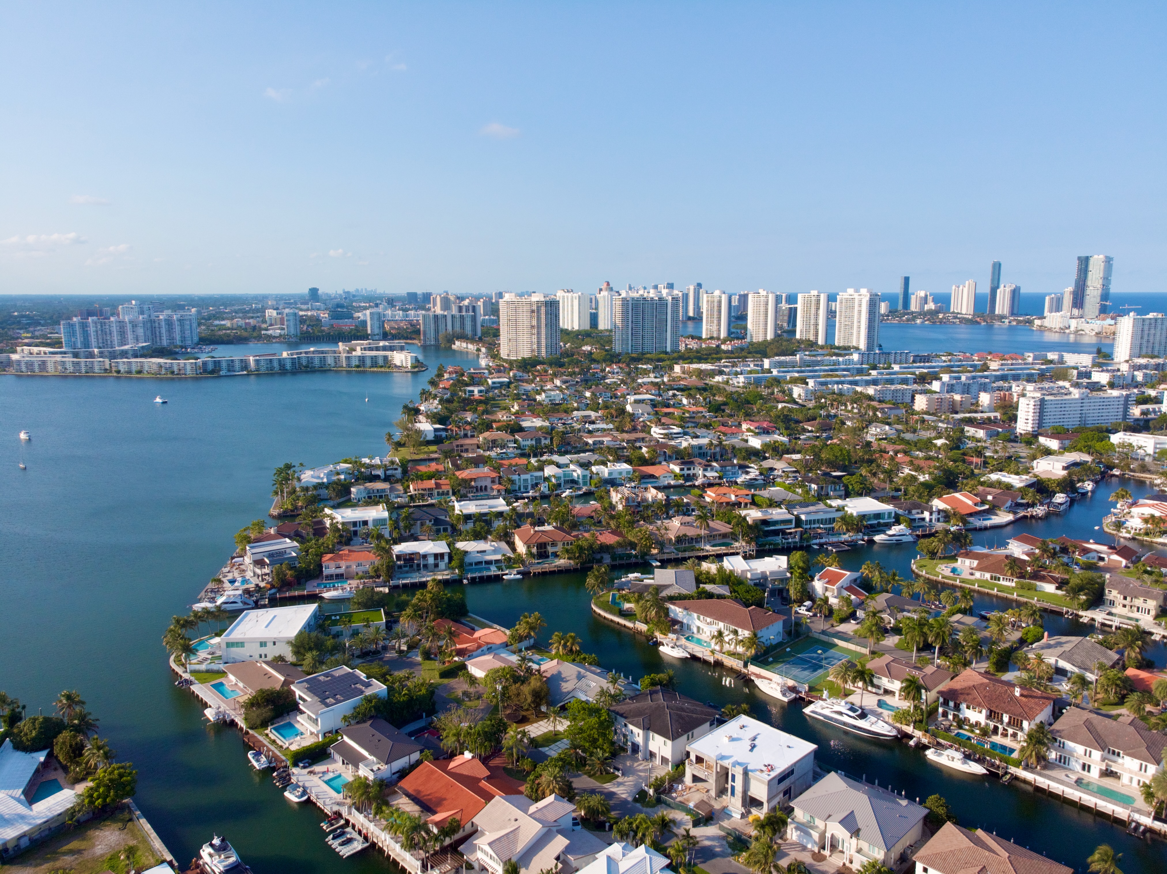 Aerial view of Eastern Shores North Miami Beach showing the guard-gated peninsula and deep water canal access to the Intracoastal Waterway