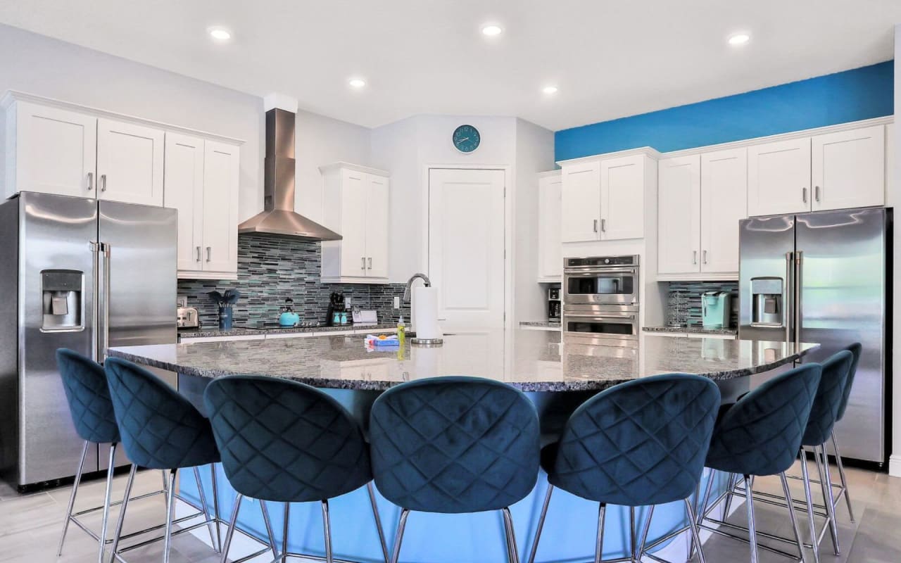 stainless steel appliances built in, including a sink and cooktop.