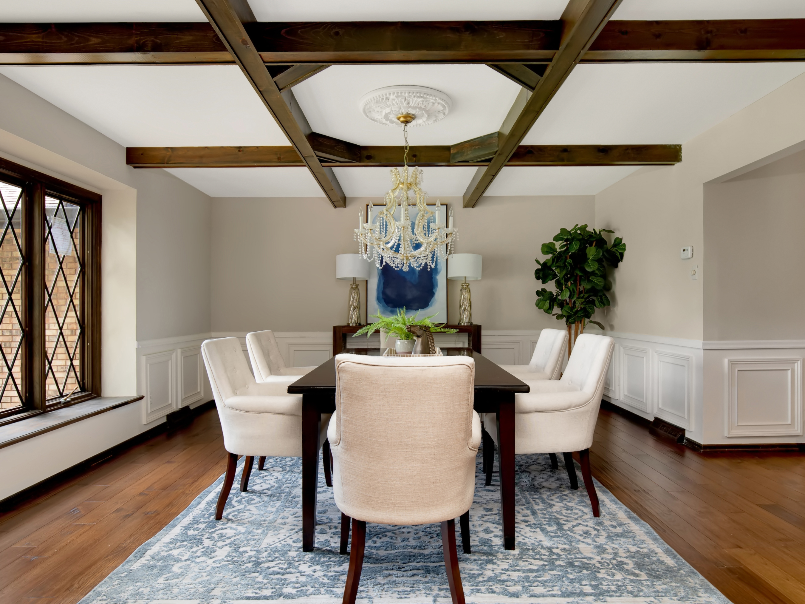 Dining room with coffered ceiling in a home sold by Alyssa Suntrup