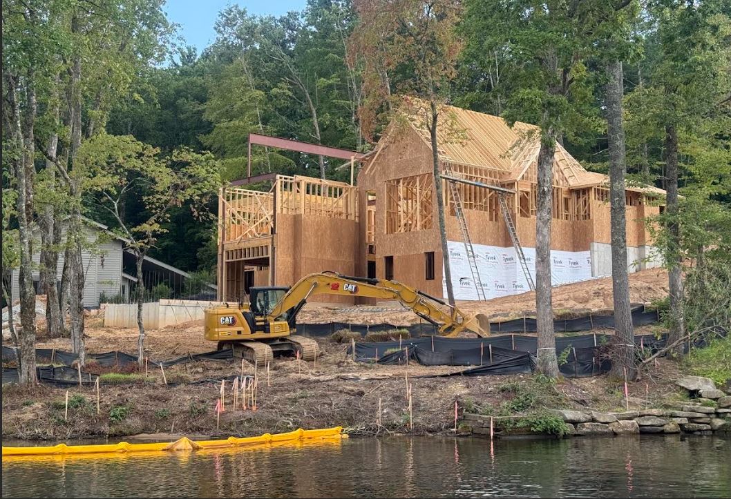 Waterfront new construction home taking shape on Lake Toxaway