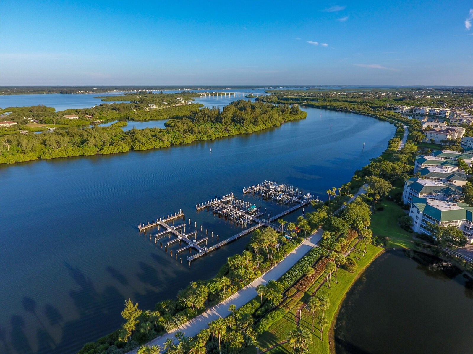 Aerial view of the Sea Oaks marina on the Indian River, Vero Beach barrier island, with the community's riverfront residences and docks