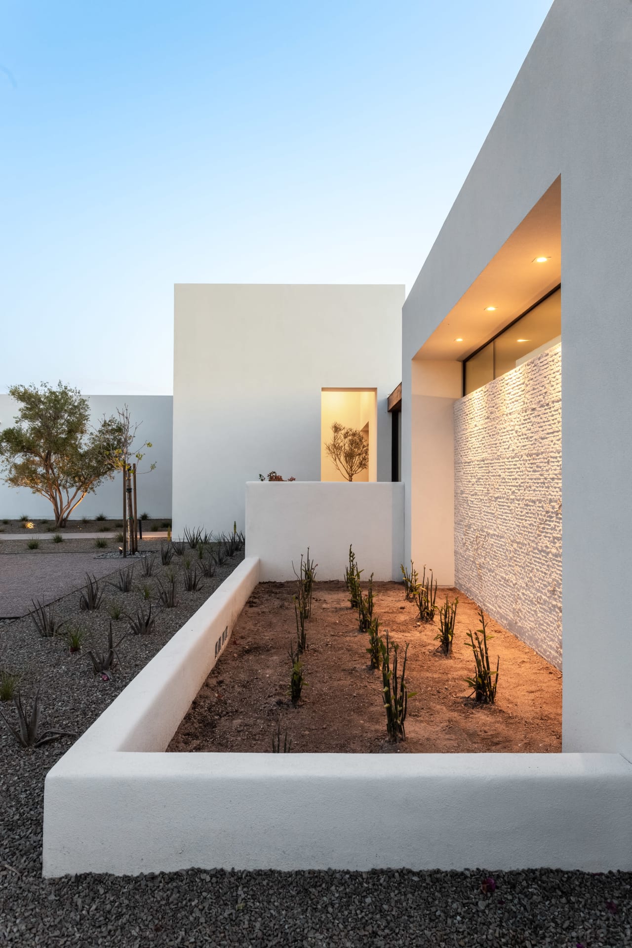 White wall exterior with desert landscape