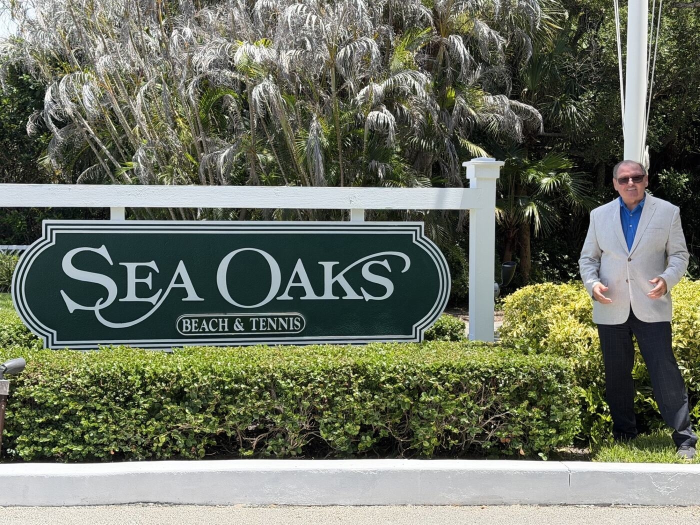 Vero Premier Properties co-founding principal at the Sea Oaks Beach and Tennis entrance sign on A1A in Vero Beach