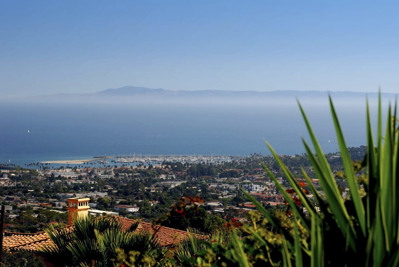 View of a Number of Houses with the Sea