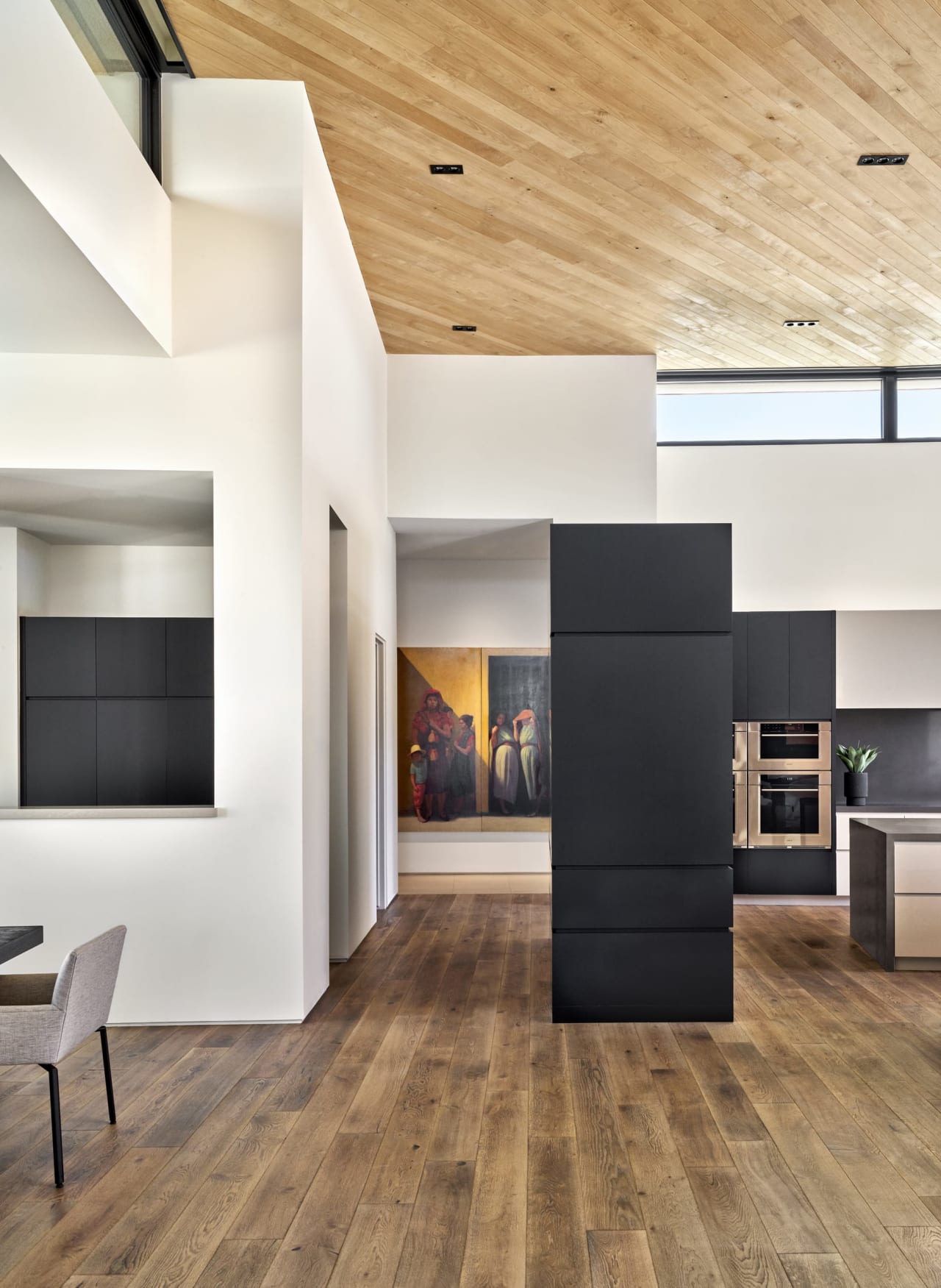 Hallway with tongue and groove ceiling