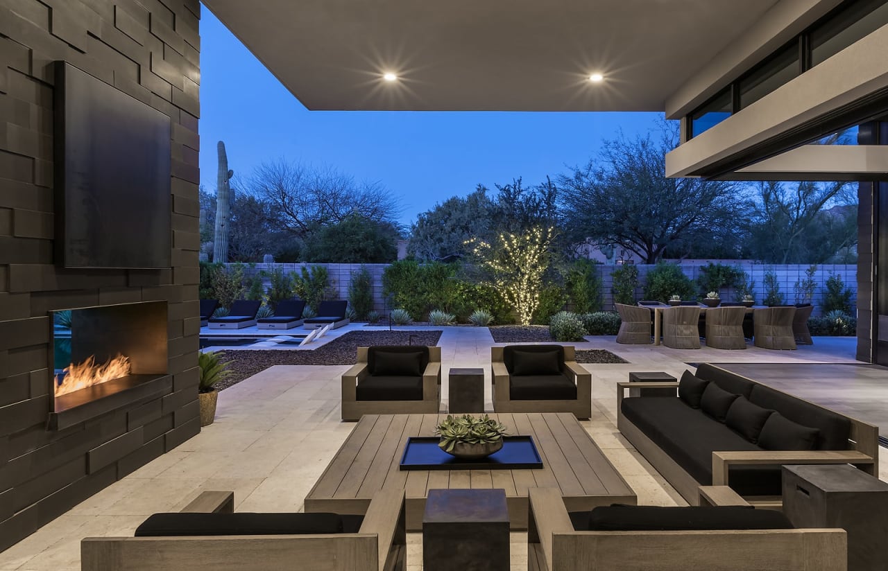 Covered back patio with outdoor living area