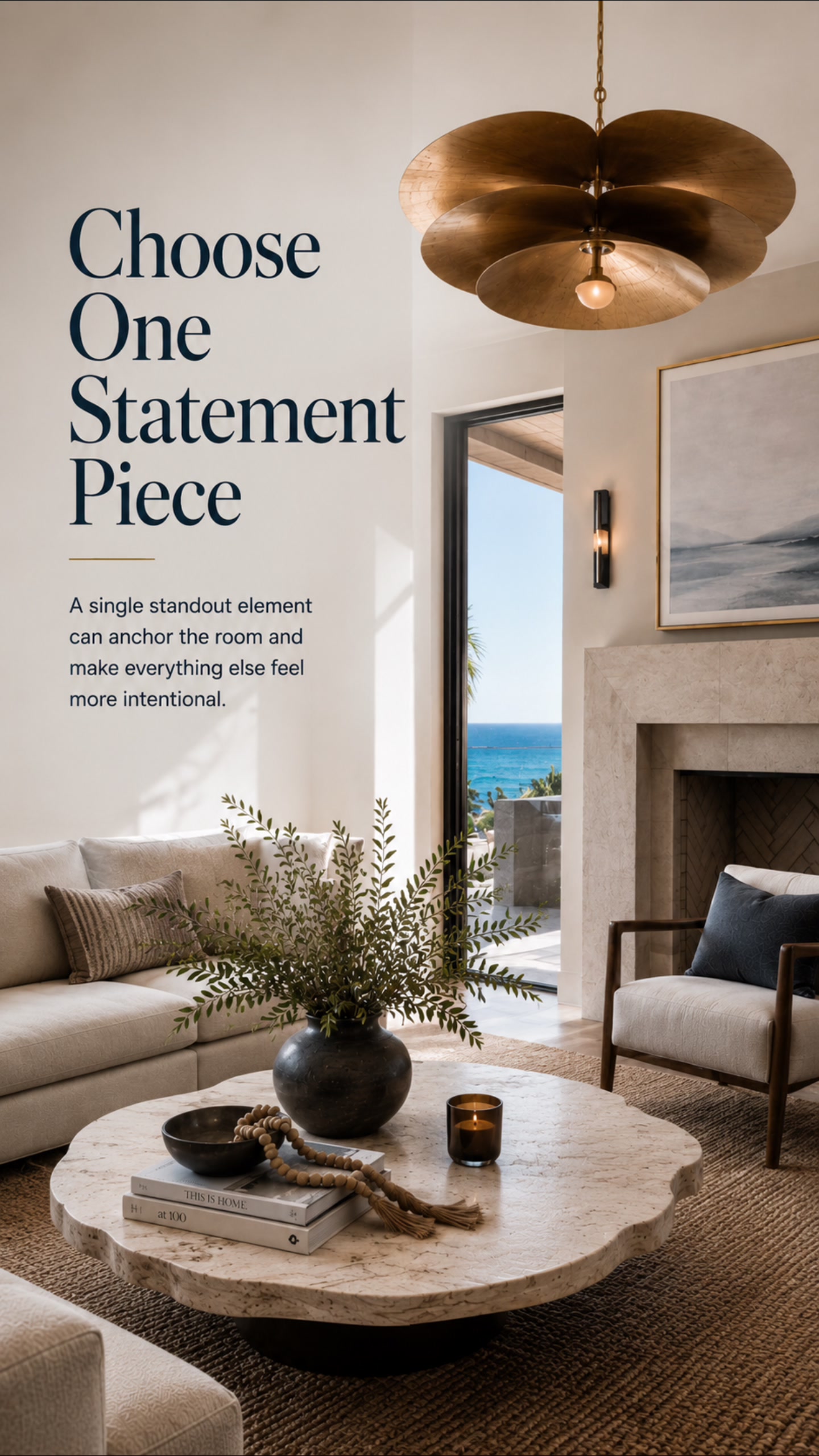 Choose one statement piece — a round travertine coffee table anchoring the room