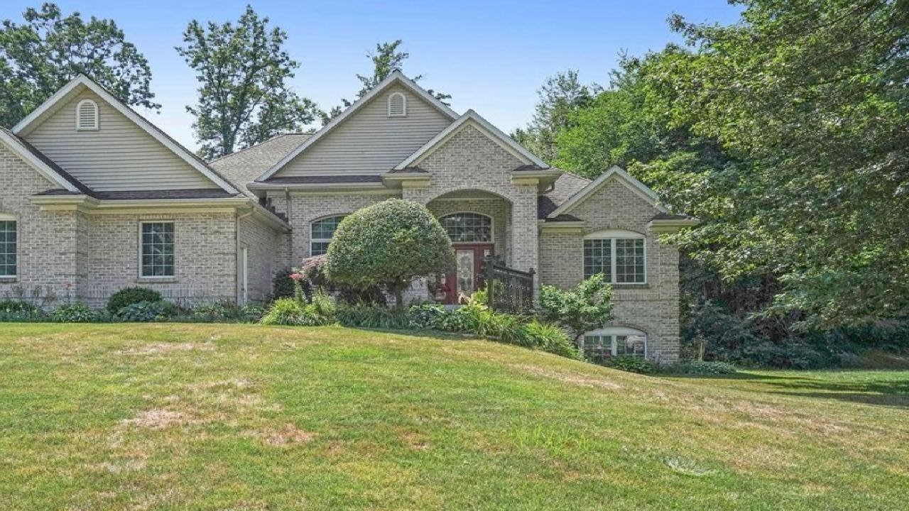 Home Surrounded by Green Trees