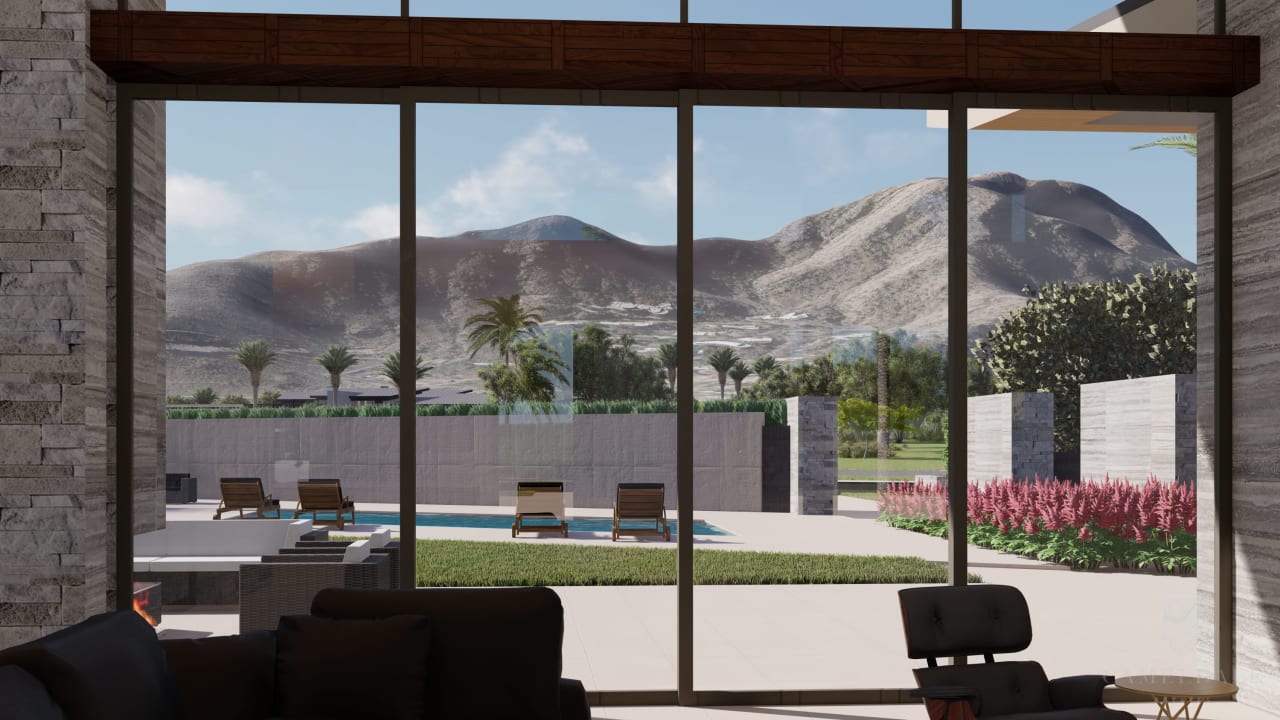 Mountain view from all glass living room in modern home