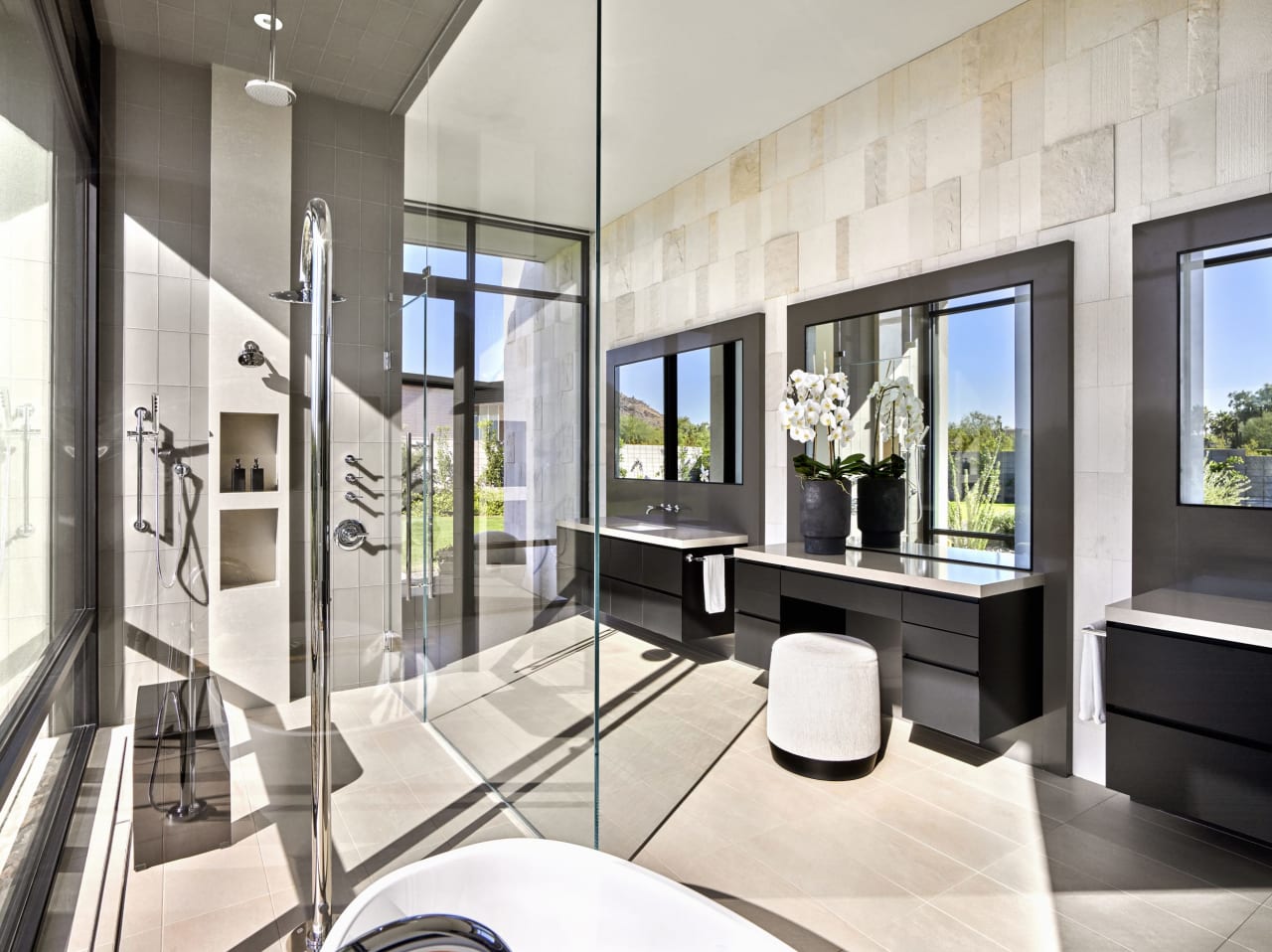 Contemporary bathroom with floating shelves in luxury home