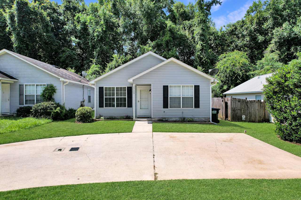 Photo of front of home from the semicircle driveway  at 2709 Oak Park Court, Tallahassee, Florida 32308