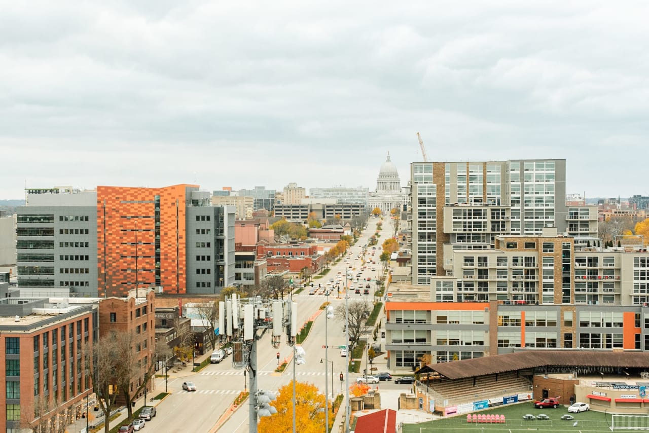 An aerial view of a city on a cloudy day.