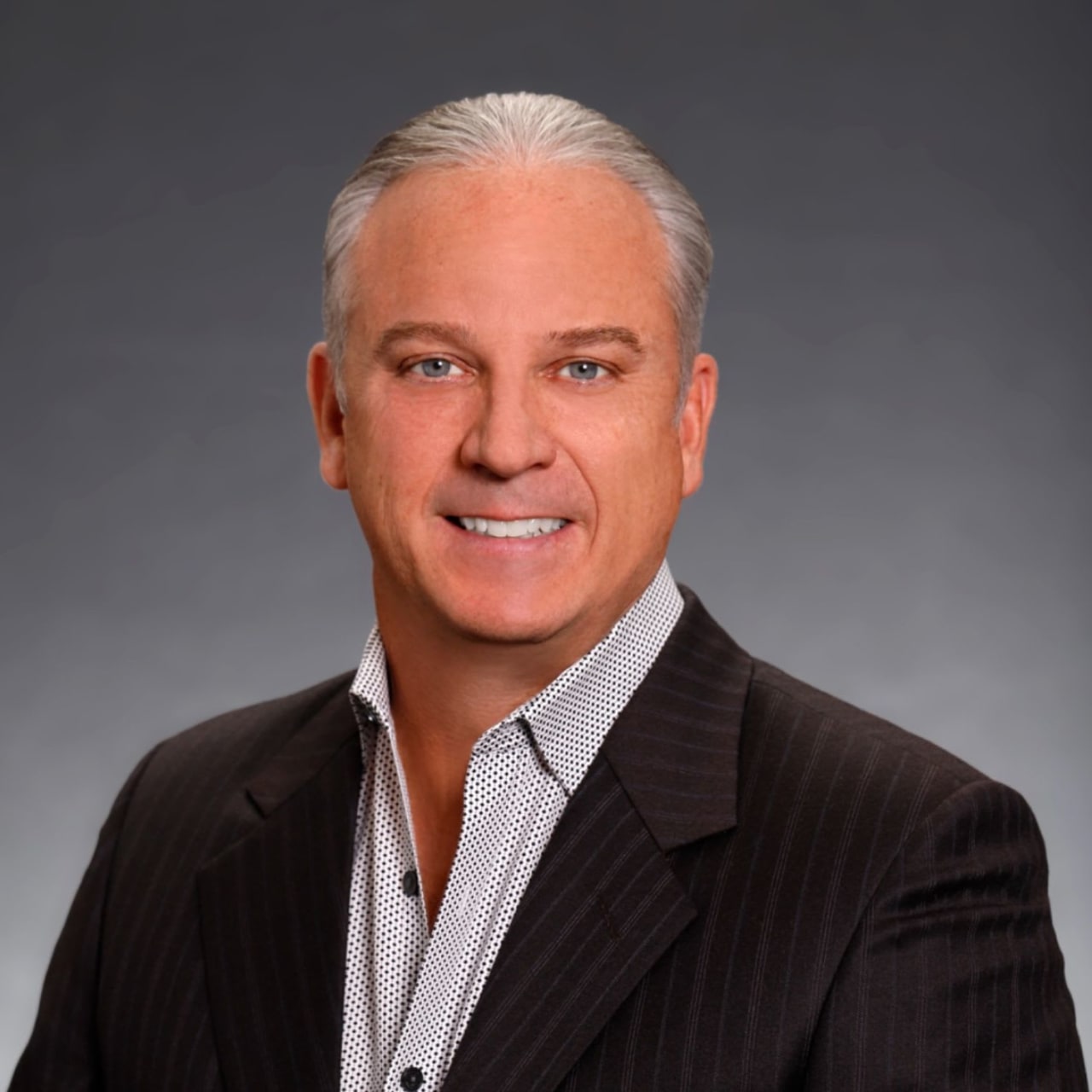 Headshot of Scott Stout, a distinguished Austin Real Estate Expert