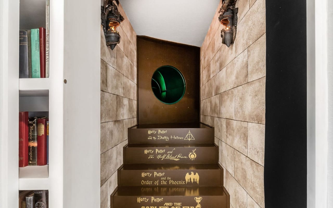 A staircase decorated with Harry Potter book titles.