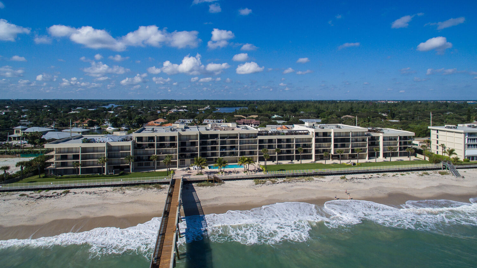 Aerial view of an oceanfront luxury condominium on the Vero Beach barrier island, Florida