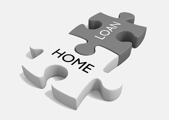 Two puzzle pieces that say  "HOME" and "LOAN"  written on them.