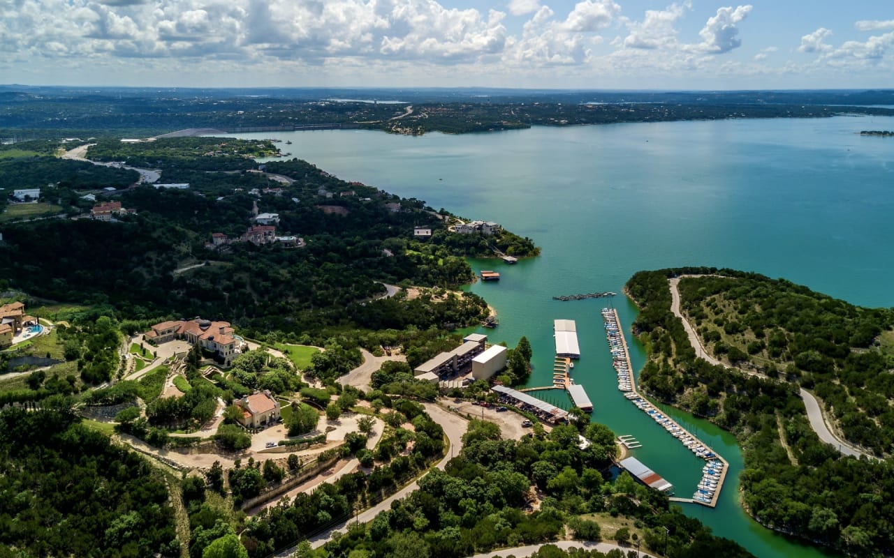 Panoramic View of the Sea by the Green Trees and Houses