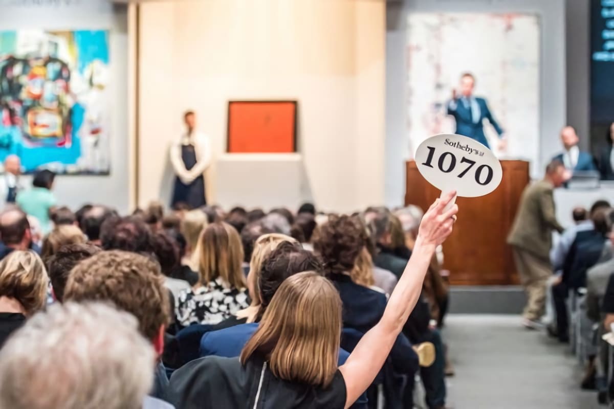 A lady with 1070 auction number in the Sotheby's Auction House