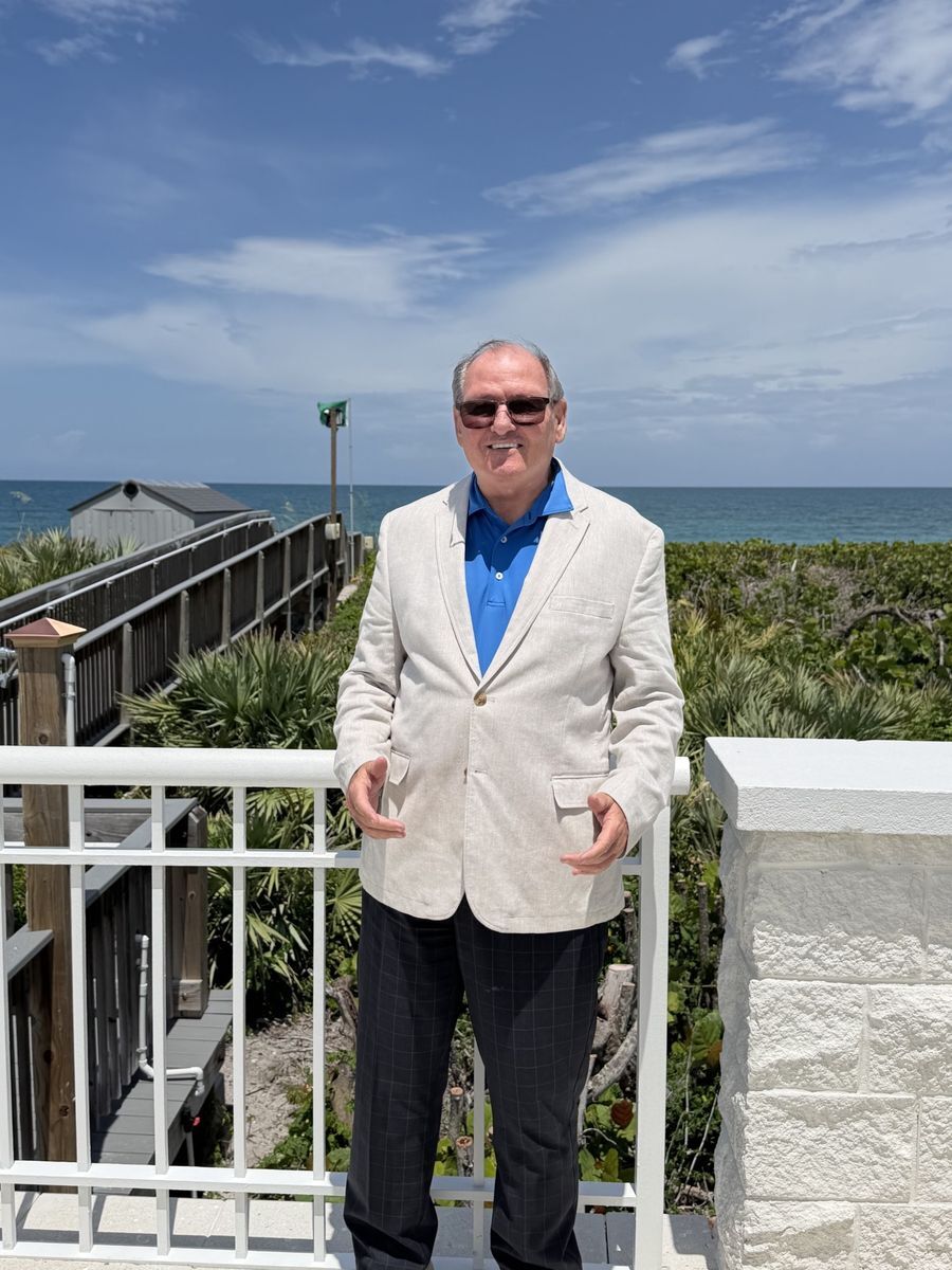 J. Vance Brinkerhoff, Co-Founding Principal of Vero Premier Properties, on the oceanfront in Vero Beach