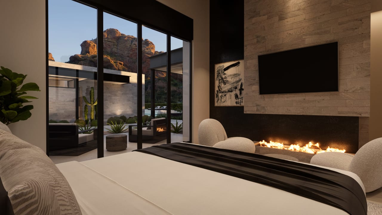 Luxury primary suite with mountain views