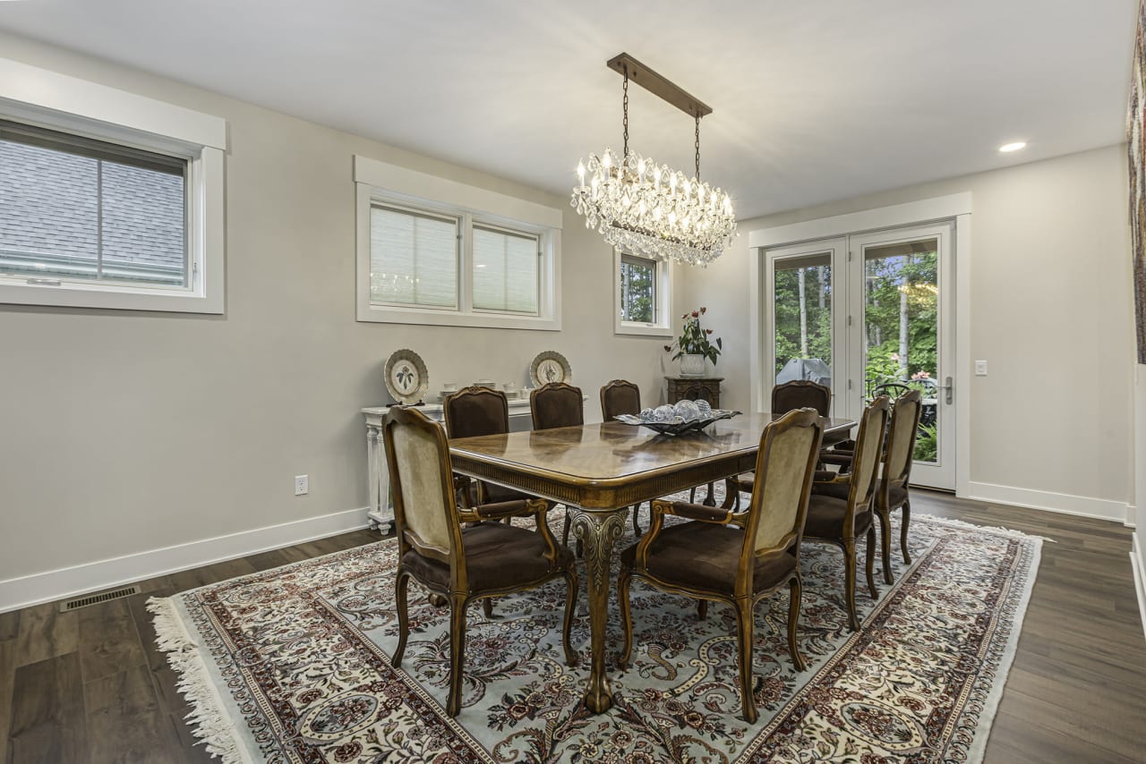 dining area with wooden table and chairs