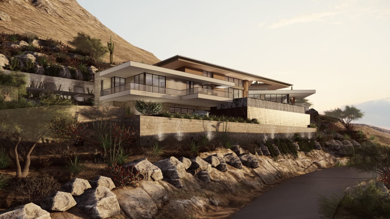 Modern home made of wood, concrete and glass on hillside lot