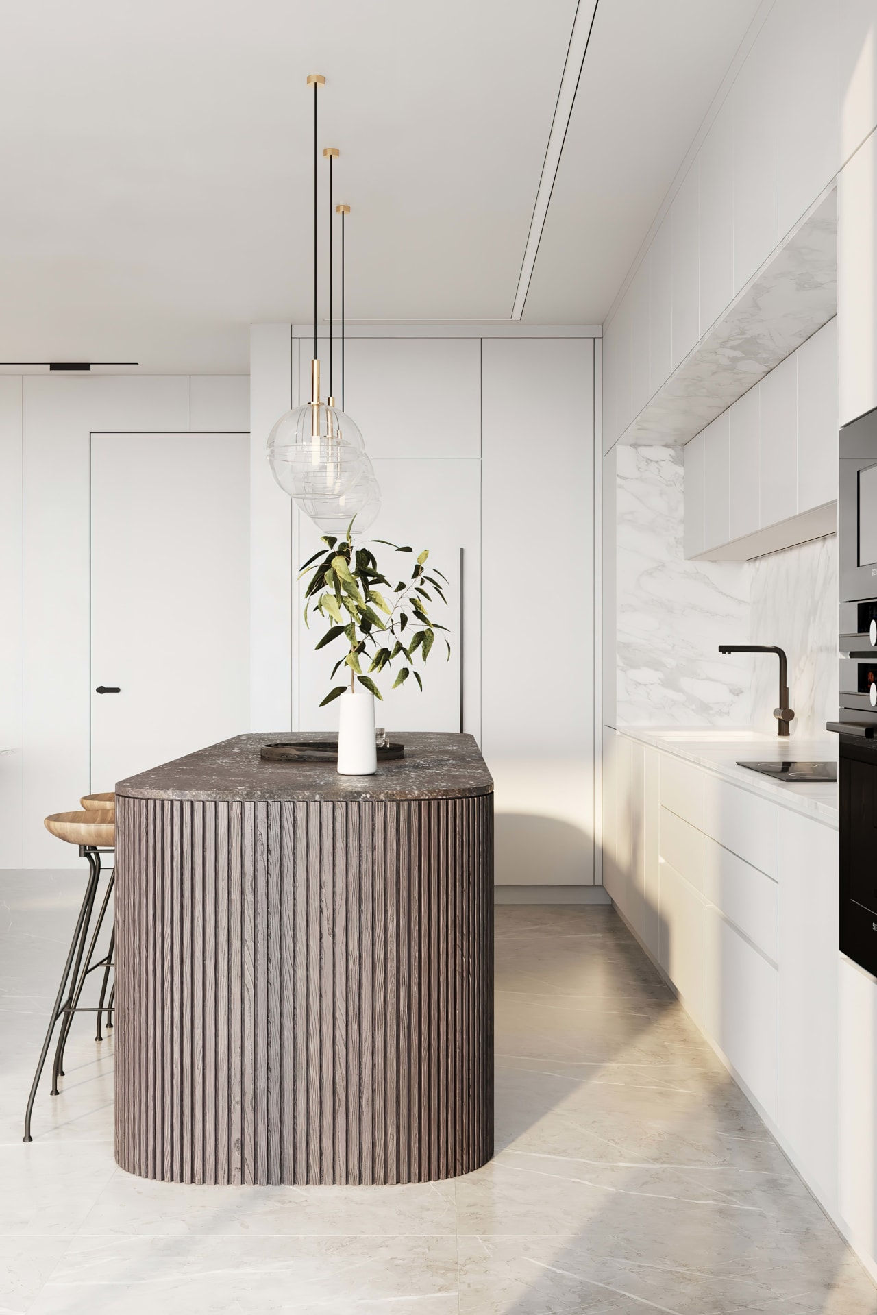 A modern kitchen with a curved island made of wood with a marble countertop.