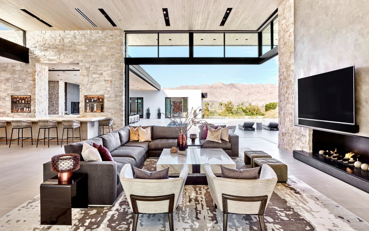 Luxury modern estate with indoor outdoor living and mountain views