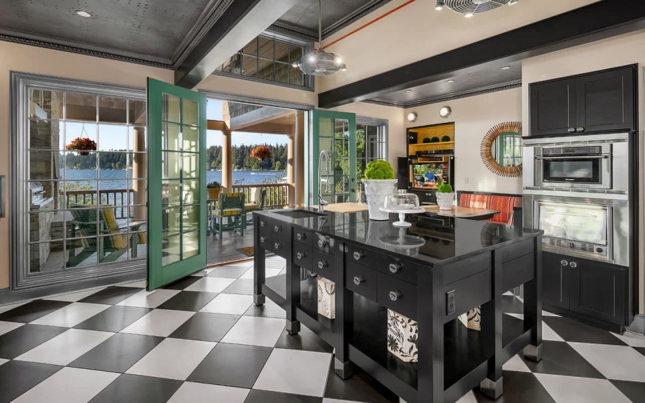 black and white checkered floor in a small kitchen