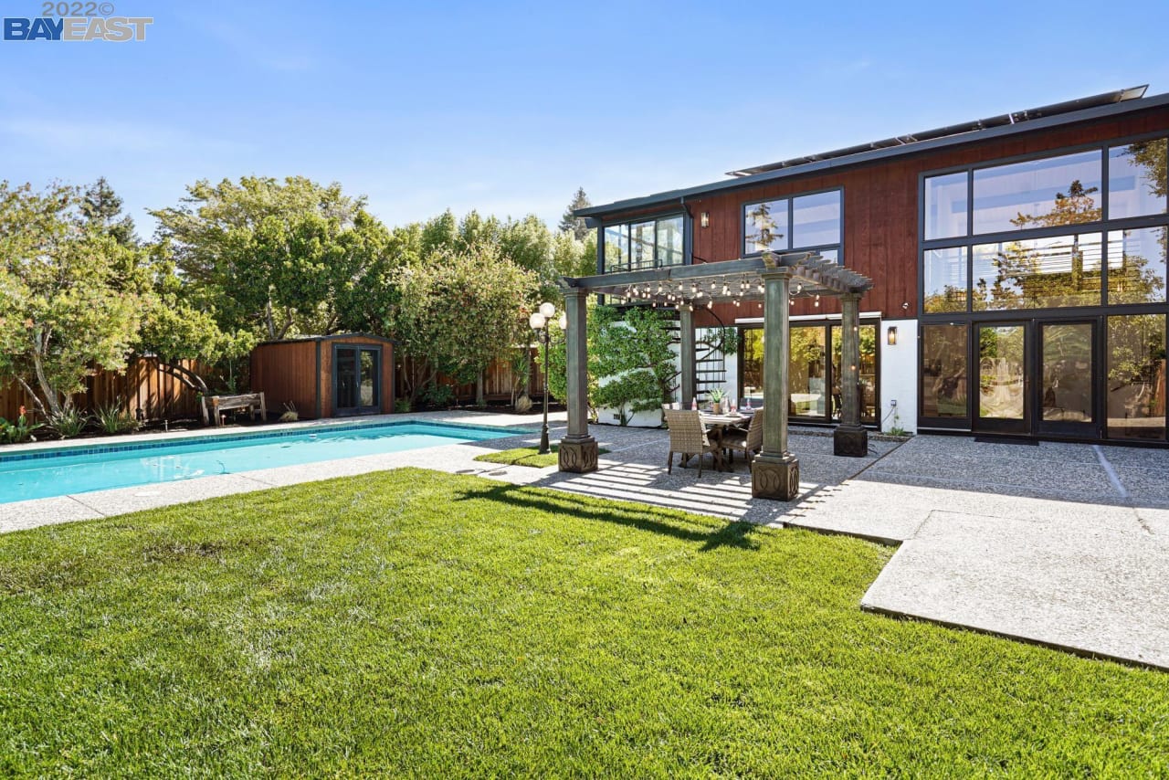 house with backyard and pool