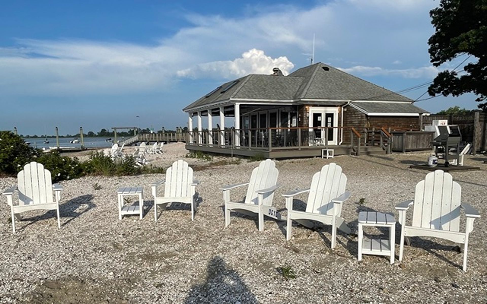 Riverside waterfront home with a dock, or sailboats at the yacht club