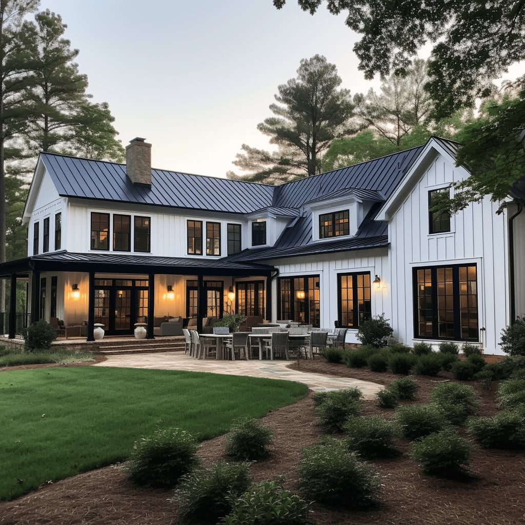 A large two-story white farmhouse with a black metal roof