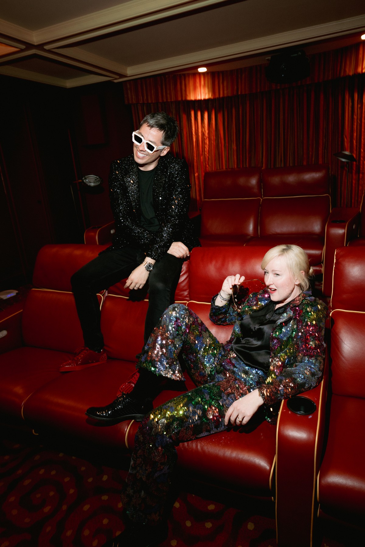 Brandon and Mallory Bogard together in the red leather theater