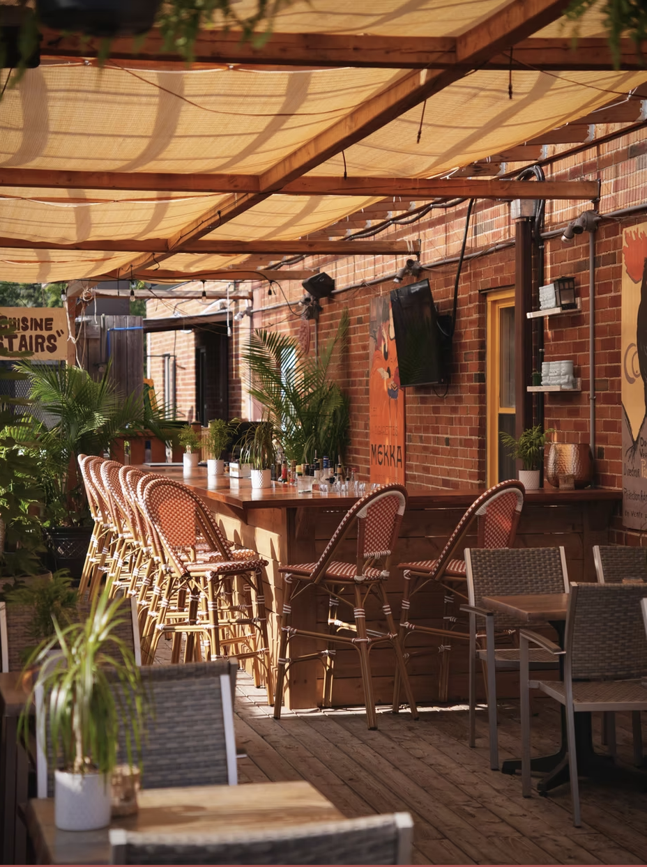 Merlot's rooftop patio in The Kingsway under its pergola and shade sails