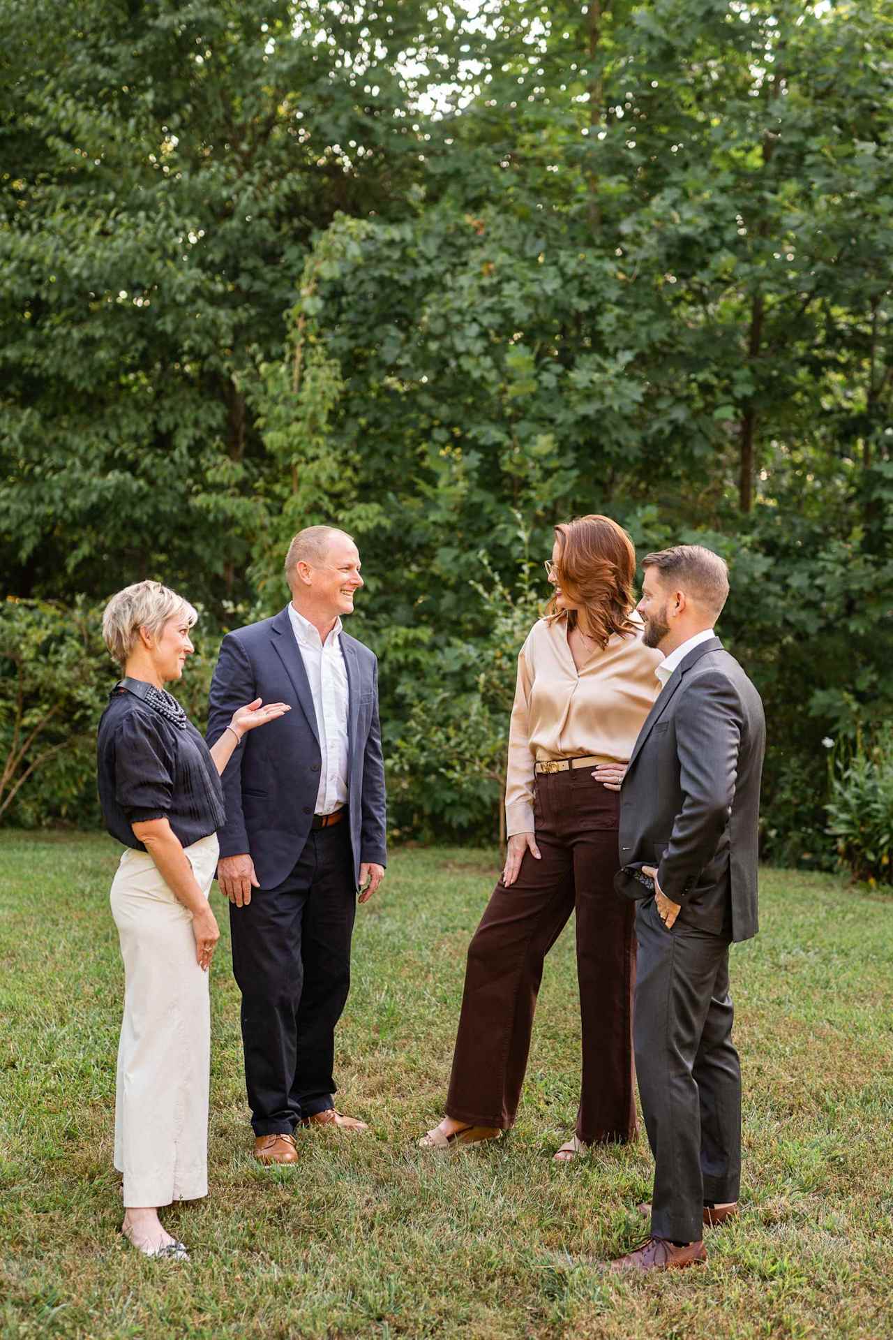 The vignette Real estate team discussing strategies for listing clients and buyers in a garden located in Cashiers, NC