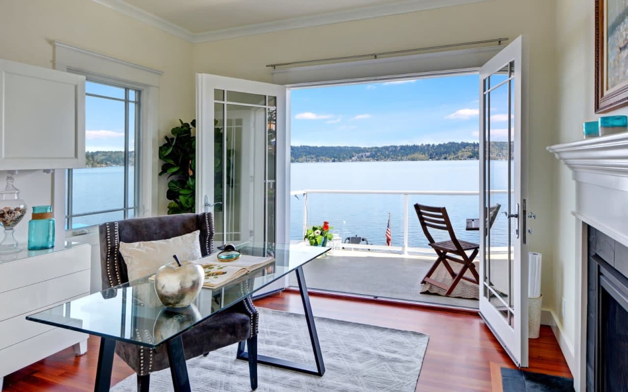 Home office with a view of a lake