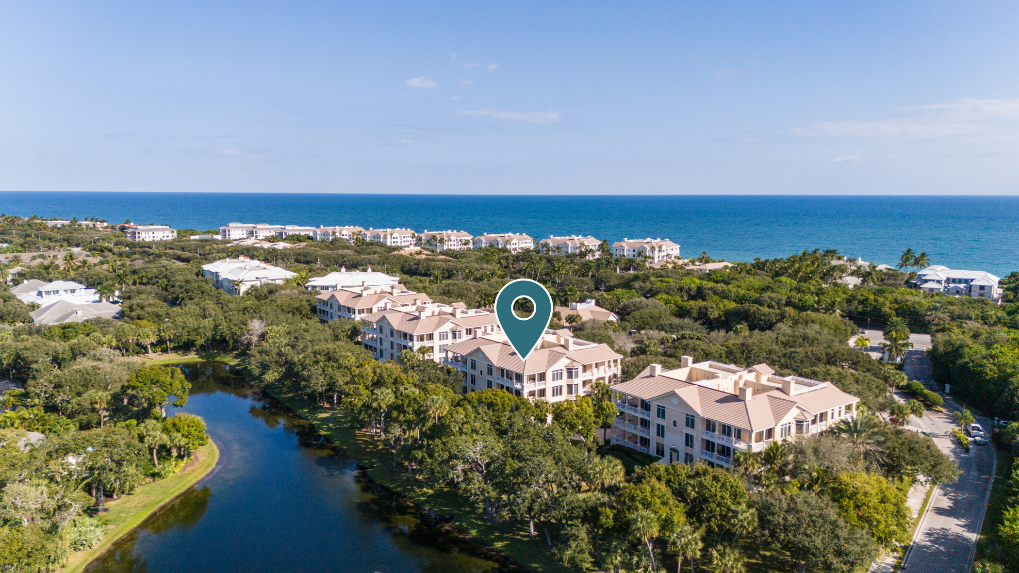 Aerial view of Vero Beach barrier island luxury condominiums with ocean views