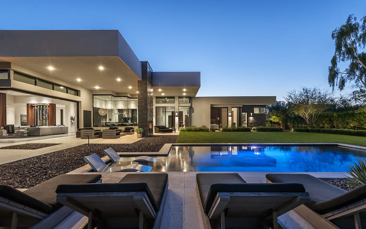 Backyard of modern estate with outdoor pool