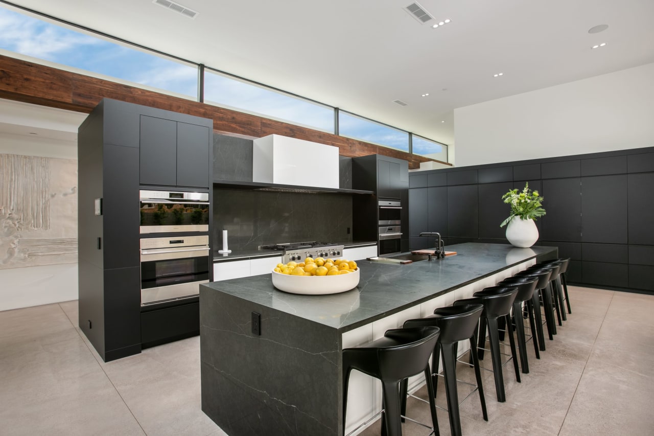 Luxury home with modern kitchen and black accents