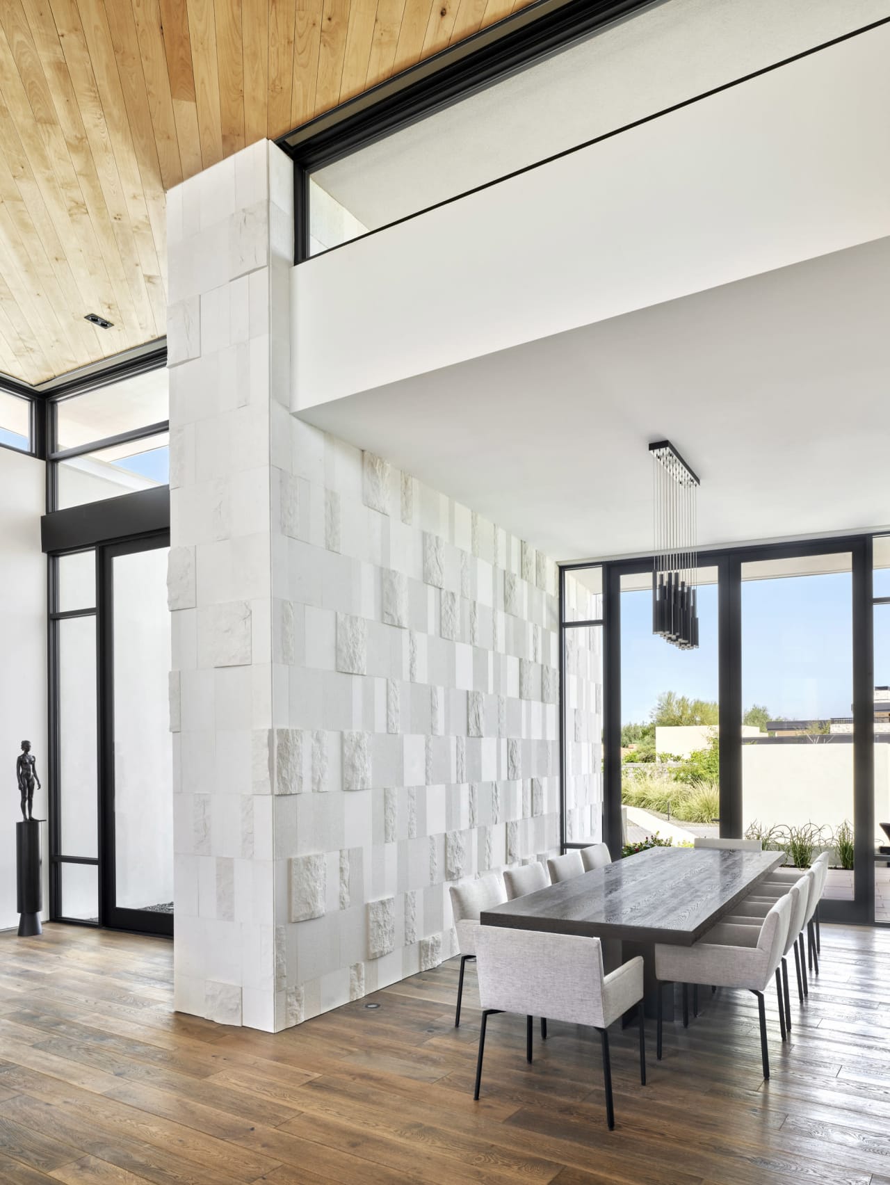 Limestone entry and dining room of modern luxury home