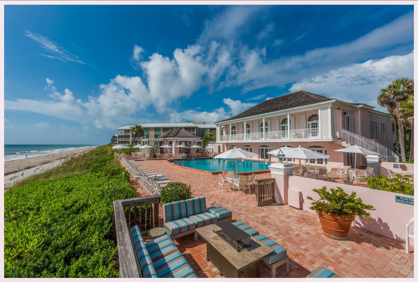 Oceanfront beach club with pool, lounge seating, and Atlantic views on the Vero Beach barrier island