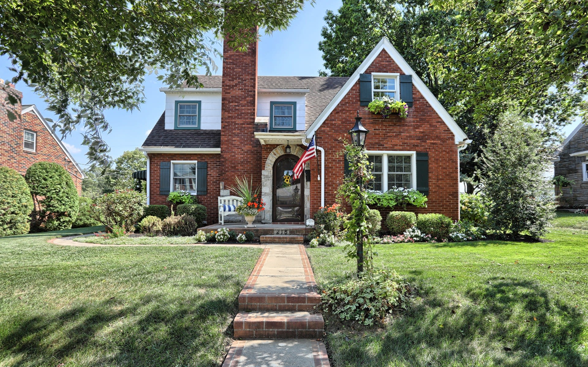 Brick home shown in Team Becker’s Hershey neighborhood guide