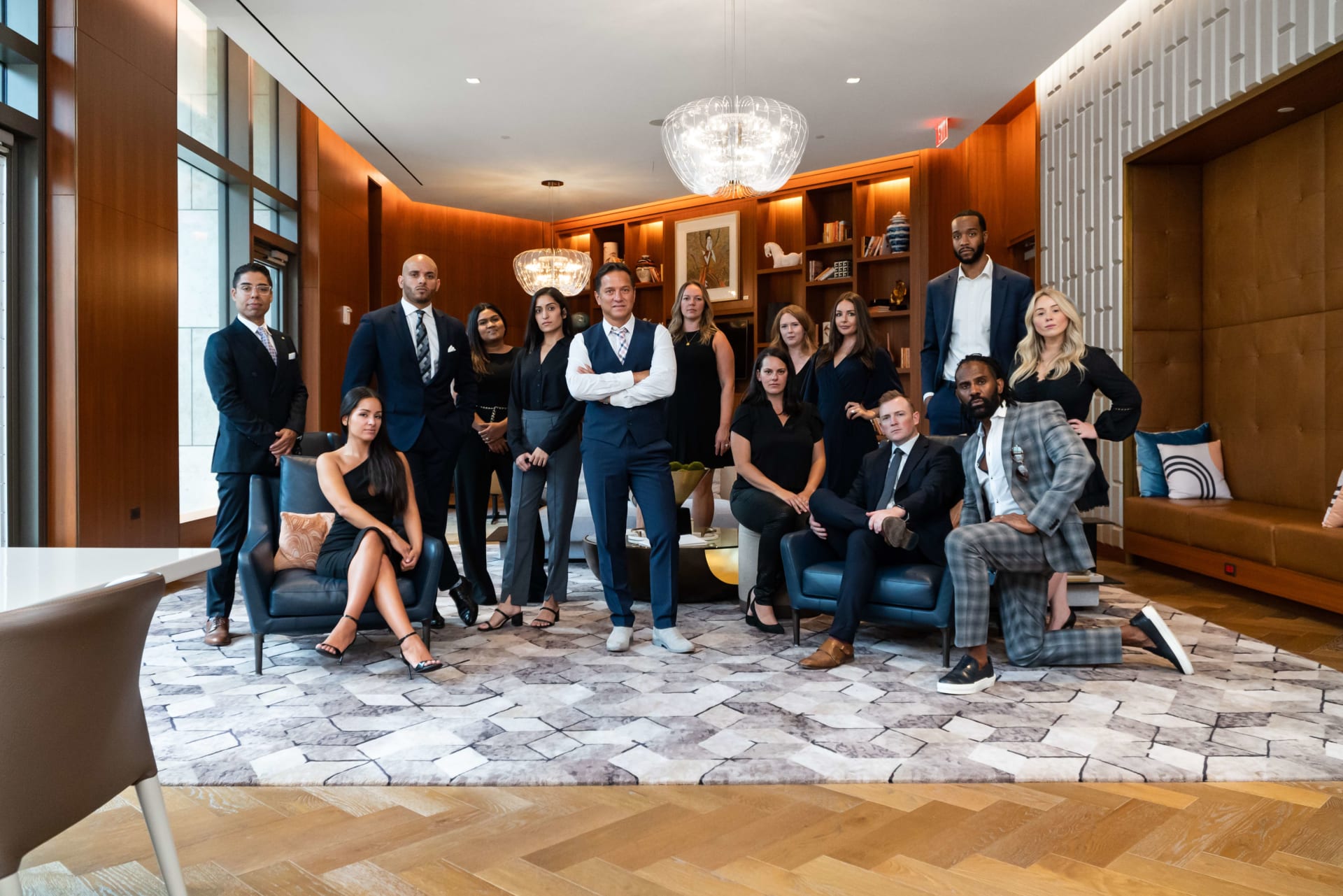 Team Francesco, real estate professionals in suits on a group photo.