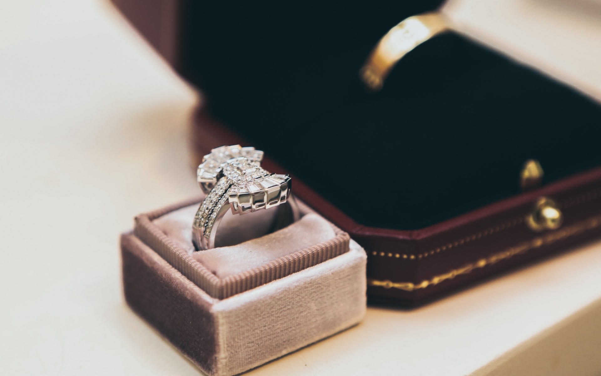 A diamond ring in a velvet ring box