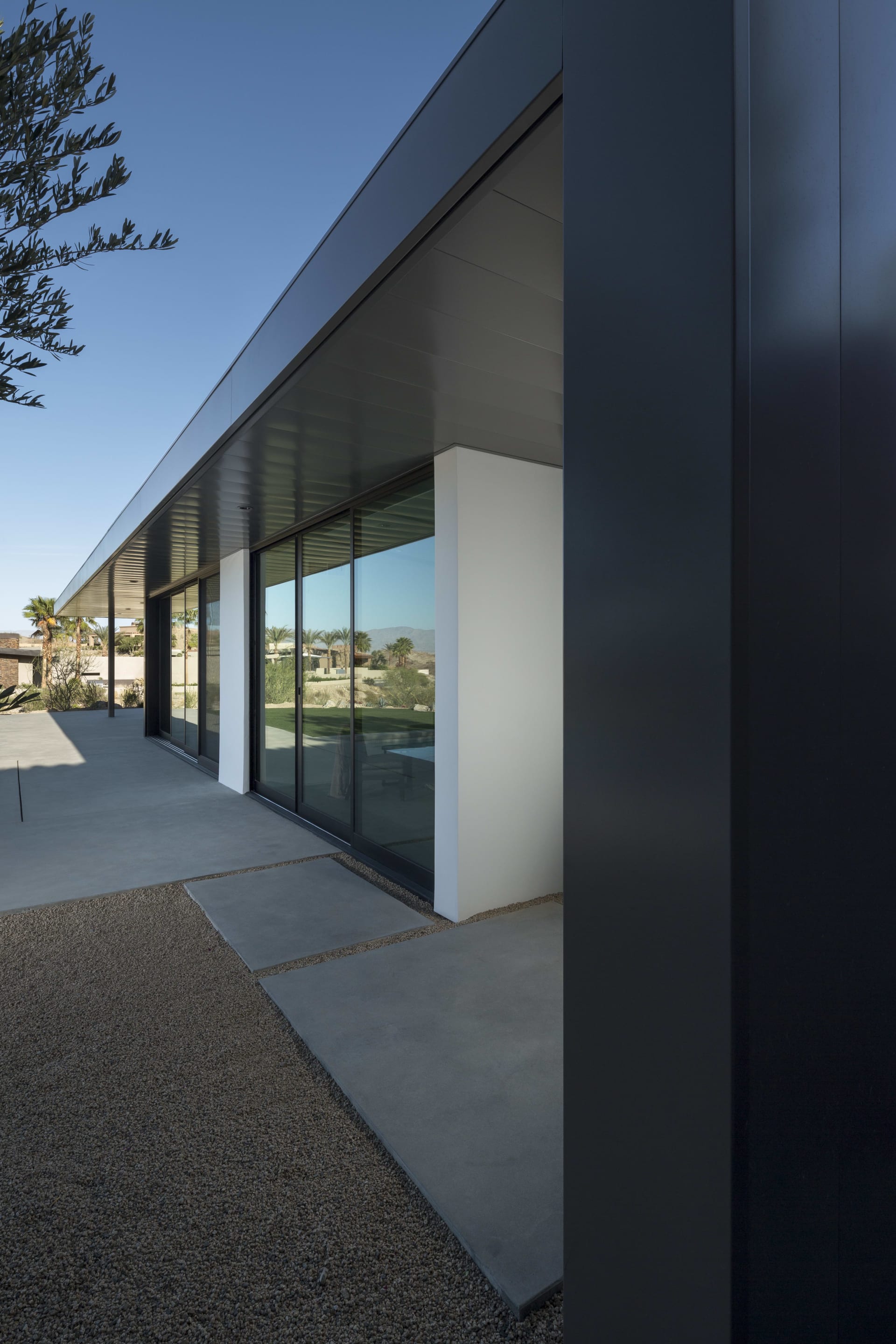 A modern house with floor-to-ceiling windows